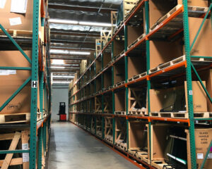 A view of The AGS warehouse featuring a selection of auto glass options for popular vehicles